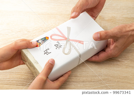 Family celebration gifts at hand 99673341