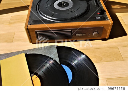 Nostalgic records and record players are fresh now. Nostalgic records and record players are fresh now. 99673356