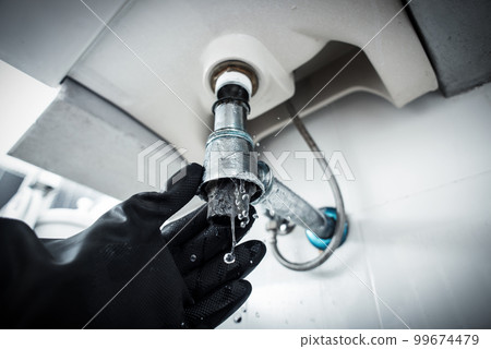clogged and leaky sink sewer 99674479