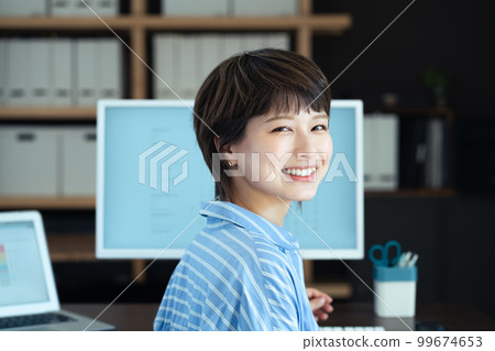 Young woman working in the office 99674653