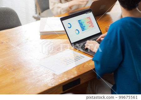 Hands of women having a meeting Hands of women having a meeting 99675561