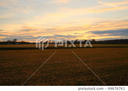 Beautiful rural landscape against scenic sunset in Meerbusch, Germany Beautiful rural landscape against scenic sunset in Meerbusch, Germany 99676761