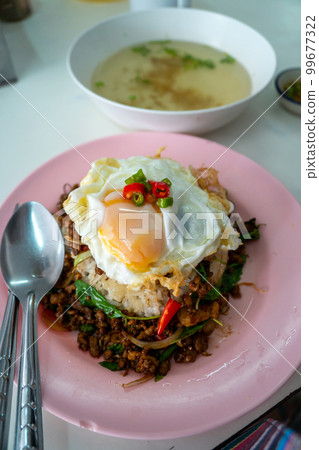 stir-fried basil with pork and fried egg stir-fried basil with pork and fried egg 99677322