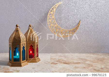 Muslim Holy Month Ramadan Kareem - Ornamental Arabic Lantern With Burning Candle Muslim Holy Month Ramadan Kareem - Ornamental Arabic Lantern With Burning Candle 99678123