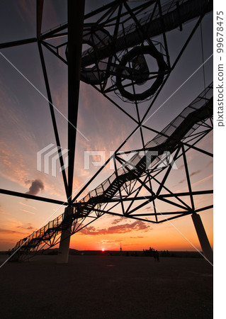 Viewing platform Tetraeder at sunset in Bottrop, Germany Viewing platform Tetraeder at sunset in Bottrop, Germany 99678475