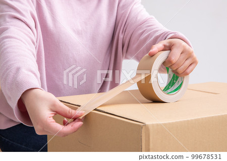A woman working on moving moving 99678531