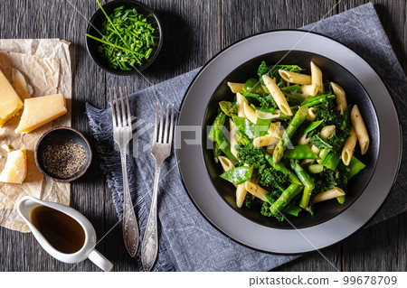 Pasta primavera with green veggies, cheese in bowl Pasta primavera with green veggies, cheese in bowl 99678709