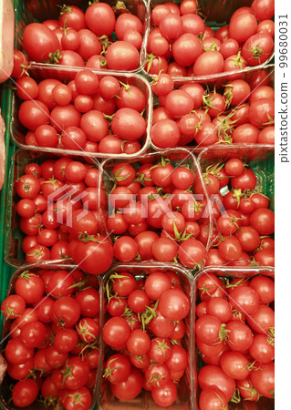 fresh tomato with water drop in a bow  fresh tomato with water drop in a bow  99680031