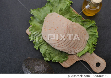 salami sausage cut into thin pieces salami sausage cut into thin pieces 99680559