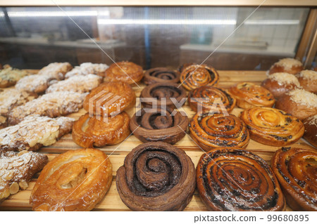 Freshly cooked bakery displaying at shop Freshly cooked bakery displaying at shop 99680895
