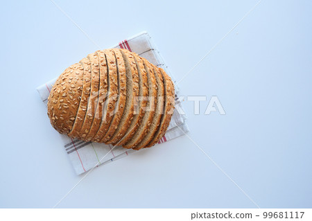 top view of slice of whole grain bread on white background top view of slice of whole grain bread on white background 99681117