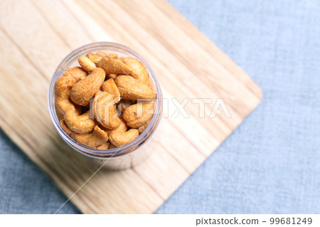 top view of cashew nuts in a jar on table  99681249