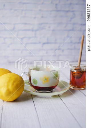 honey lemon green tea on table honey lemon green tea on table 99681257