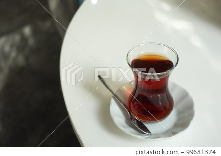 Traditional turkish tea on white table . 99681374