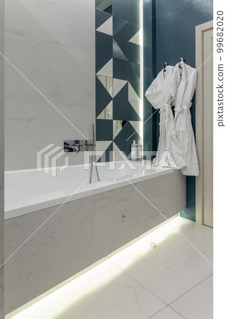 Detail of the bath tub in bathroom. 99682020