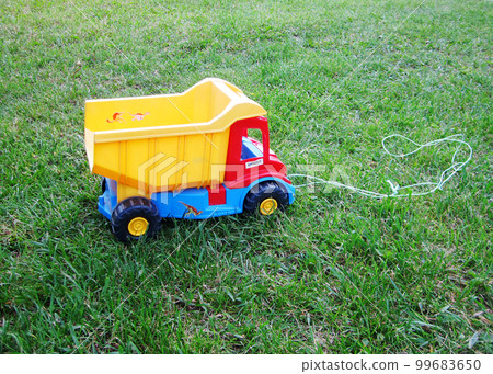 Photo on theme of plastic large children's toy truck Photo on theme of plastic large children's toy truck 99683650