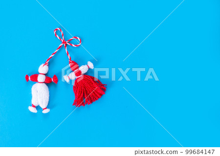 Bulgarian symbol of spring martenitsa on blue 99684147