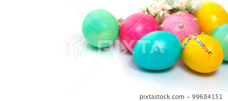 Easter eggs on white background close-up, banner 99684151