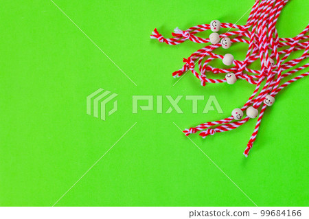 Bulgarian symbol of spring martenitsa on green 99684166