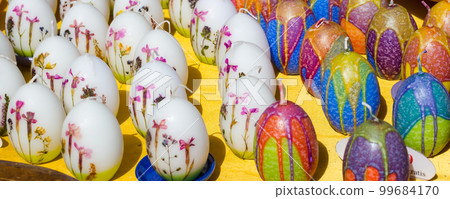 Many Colorful painted Easter eggs candles 99684170
