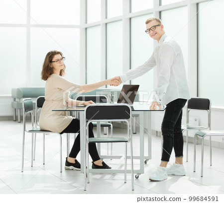welcome handshake of business people at the meeting in the office 99684591