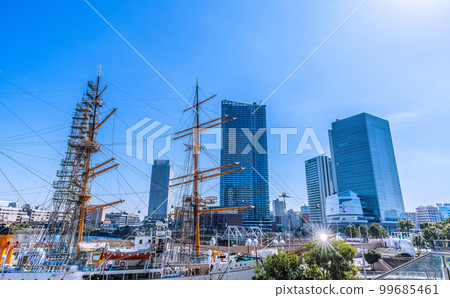 Yokohama cityscape in Japan The transformed Sakuragicho station square. View of Yokohama City Hall, skyscrapers, Nippon Maru, etc. 99685461