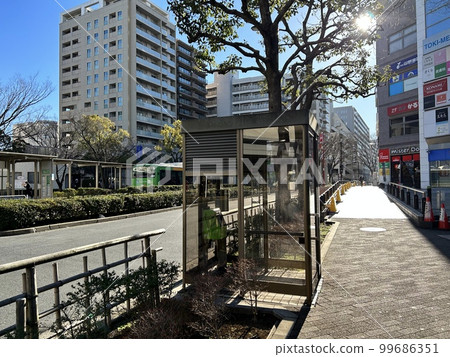 Large public telephones and telephone boxes that can be accessed while in a wheelchair 99686351