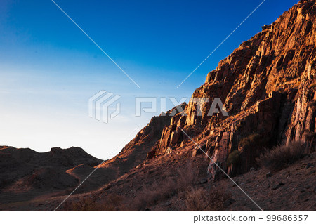 Sunrise rocky picturesque landscape in central asia, in the Almaty region of Kazakhstan Sunrise rocky picturesque landscape in central asia, in the Almaty region of Kazakhstan 99686357