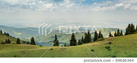 Panoramic view of the city of Almaty from the tops of the Almaty mountains. Tourist natural places of Kazakhstan, copy space 99686364