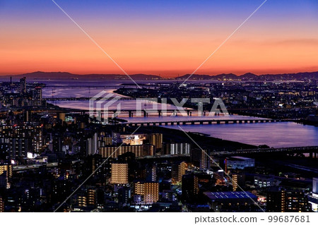 Evening view of Osaka seen from Umeda Sky Building (Osaka Bay/Akashi Kaikyo area) 99687681