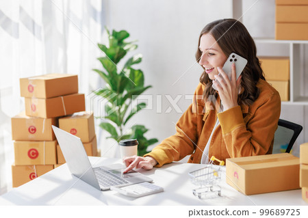 Concept of parcel delivery and selling online, Seller or retailer using smartphone to contact customers who order from online stores to confirm their orders before sending the parcel package Concept of parcel delivery and selling online, Seller or retailer using smartphone to contact customers who order from online stores to confirm their orders before sending the parcel package 99689725