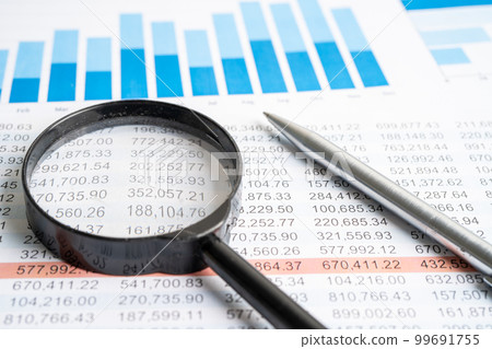 Pen on chart or graph spreadsheet paper. Financial, account, statistics and business data concept. 99691755