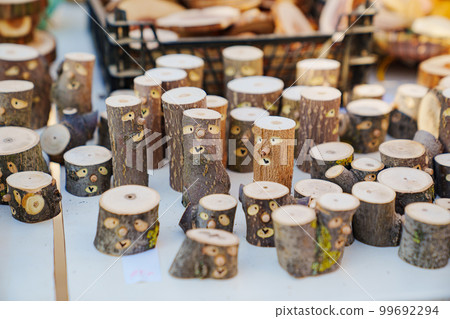 small logs with painted faces. cute souvenirs and crafts made. small logs with painted faces. cute souvenirs and crafts made. 99692294