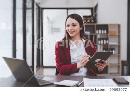 Fund managers consultation and discuss about analysis Investment stock market by digital tablet Fund managers consultation and discuss about analysis Investment stock market by digital tablet 99693977