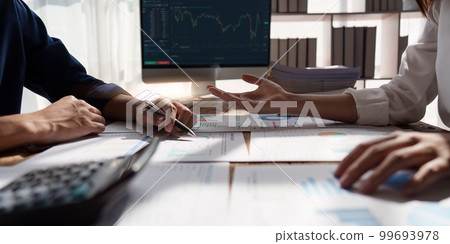 Close up business people analyze fund investment. Business Consulting, meeting, finance investment, Accounting concept. Close up business people analyze fund investment. Business Consulting, meeting, finance investment, Accounting concept. 99693978