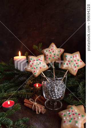 beautifully decorated gingerbread in the shape of a star beautifully decorated gingerbread in the shape of a star 99694228