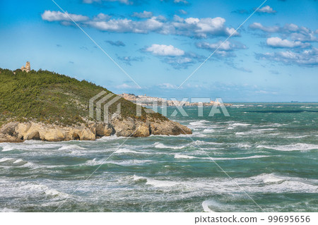 Above the cliffs at the coastline of Vieste. Summer rocky sea coast Baia Di Campi Vieste on the Gargano peninsula 99695656