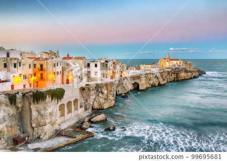 Vieste - beautiful coastal town on the rocks in Puglia Vieste - beautiful coastal town on the rocks in Puglia 99695681