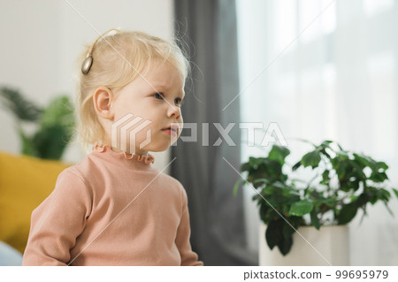 Cochlear implant system. Installation cochlear implant on child girl ear for restores hearing. Kid hears after hear return to normal, copy space and empty space for text Cochlear implant system. Installation cochlear implant on child girl ear for restores hearing. Kid hears after hear return to normal, copy space and empty space for text 99695979