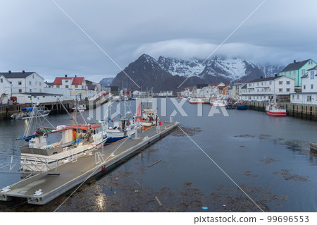 Henningsvaer village island downtown Skyline, Norway. Financial district and business centers in smart urban city in Europe. Skyscraper and high-rise buildings at night. Henningsvaer village island downtown Skyline, Norway. Financial district and business centers in smart urban city in Europe. Skyscraper and high-rise buildings at night. 99696553