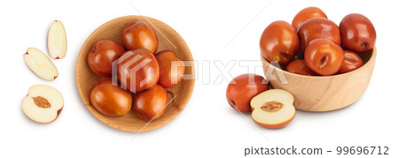 jujube or chinese date in wooden bowl isolated on white background . Top view. Flat lay 99696712
