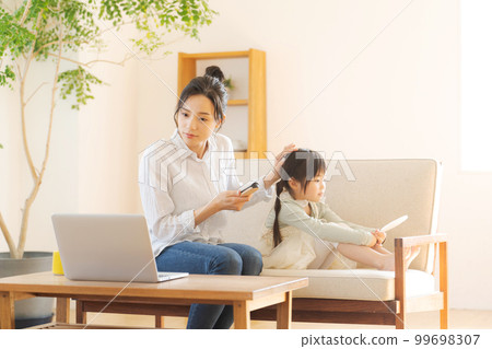 happy mother and daughter portrait 99698307