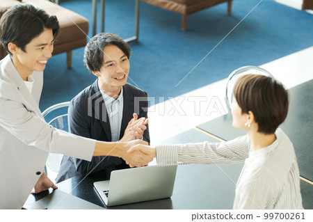 Business person image shaking hands 99700261