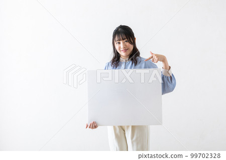 A woman with a panel A woman with a panel 99702328