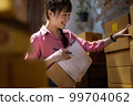 Asian teenager owner business woman work at home for online shopping and sale. 99704062
