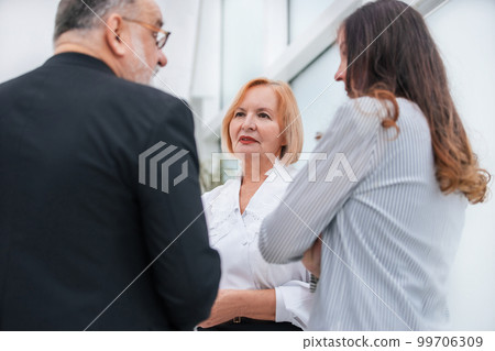 close up. serious business colleagues talking about something in the office 99706309