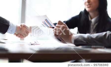 image of a business handshake business women with business partner image of a business handshake business women with business partner 99706940