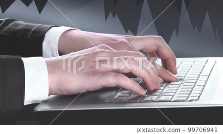 Closeup of businessman typing on laptop computer Closeup of businessman typing on laptop computer 99706941