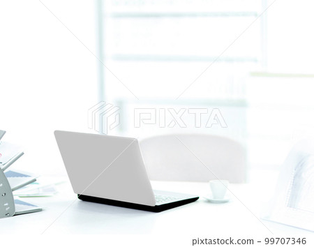 Demonstration laptop in the office, rear view. Workplace of the businessman Demonstration laptop in the office, rear view. Workplace of the businessman 99707346