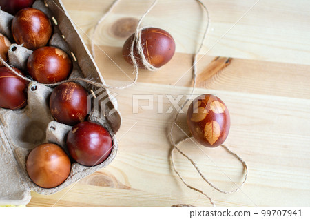 Painted eggs cooked for Easter are in an eco-friendly tray. drawings on easter eggs Painted eggs cooked for Easter are in an eco-friendly tray. drawings on easter eggs 99707941